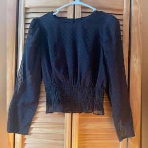 Black textured with polka dots and sheer arms size small from express